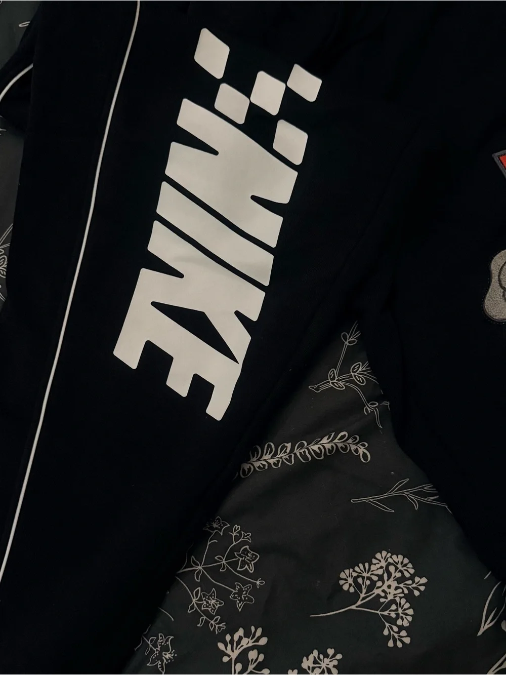 Nike Black Zip-Up Sweatpants with White Logo